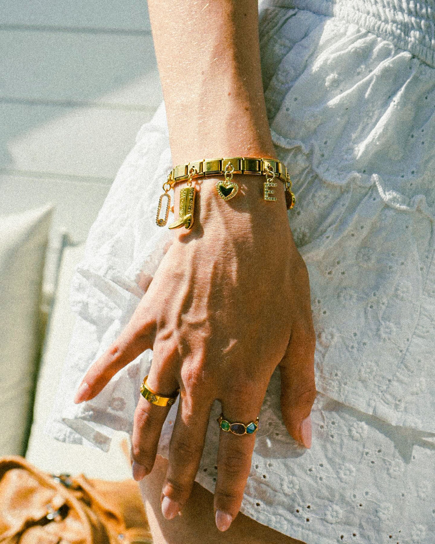 Custom Italian charm bracelet worn daily, build your own charm bracelet style with unique charms