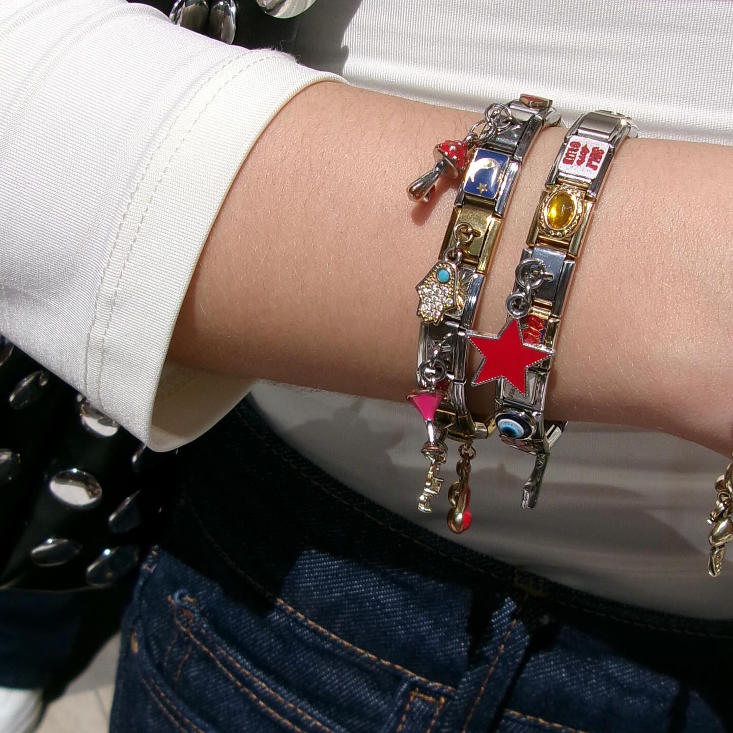 close up of 9mm italian charm bracelet with colorful enamel charms