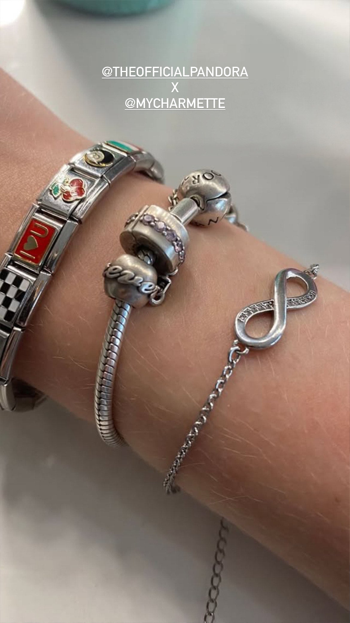 close up of stainless steel italian charm bracelet details