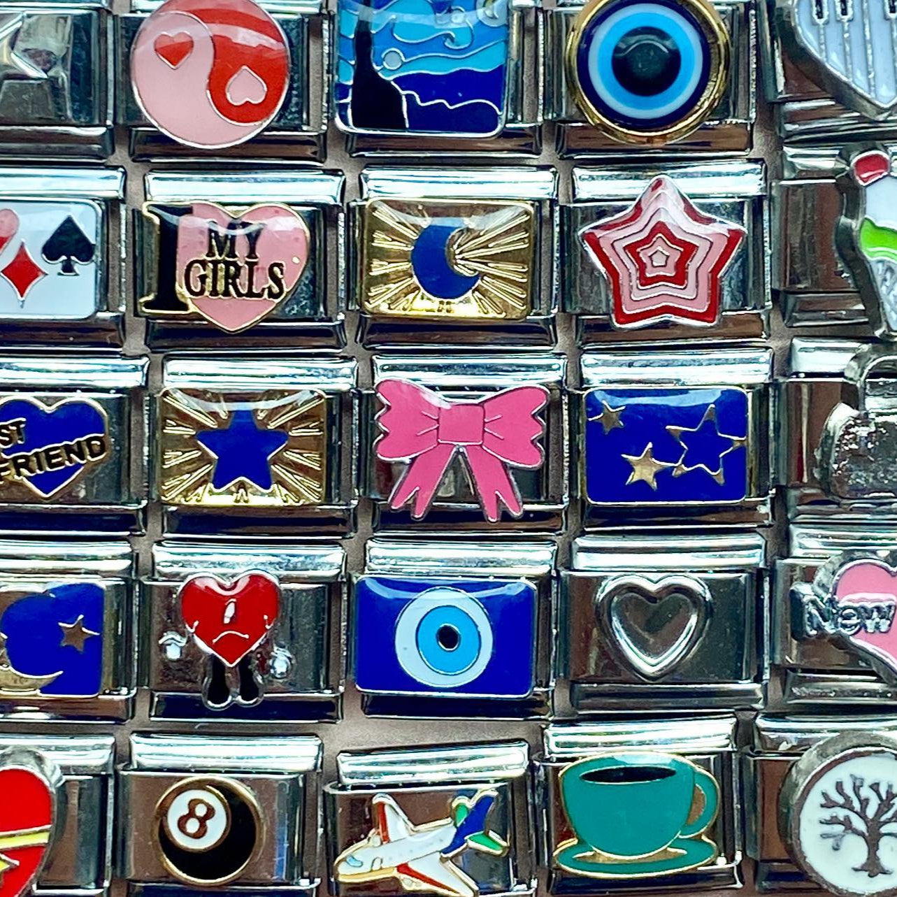 italian charm bracelet stacked with minimalist jewelry