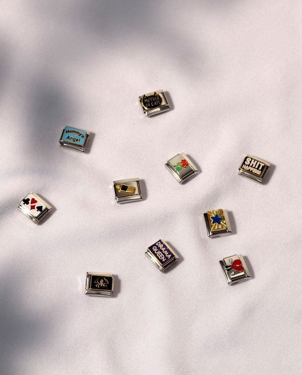 italian charm bracelet styled with colorful enamel charms