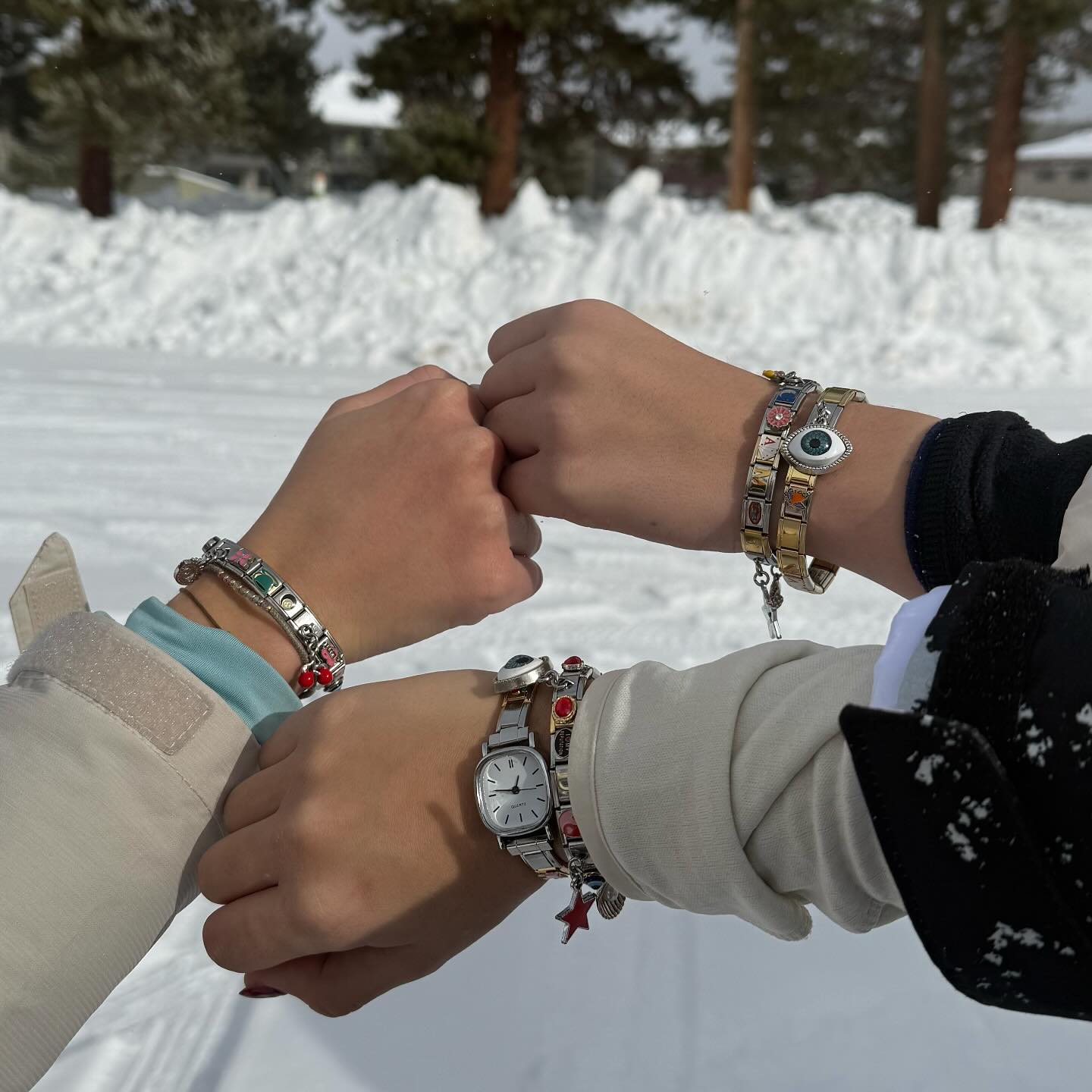 italian charm bracelet worn with casual summer outfit